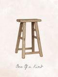 Vintage Elm Wood Stool with a rustic finish, showcasing unique wood grain, natural imperfections, and timeless charm. A perfect accent for any space